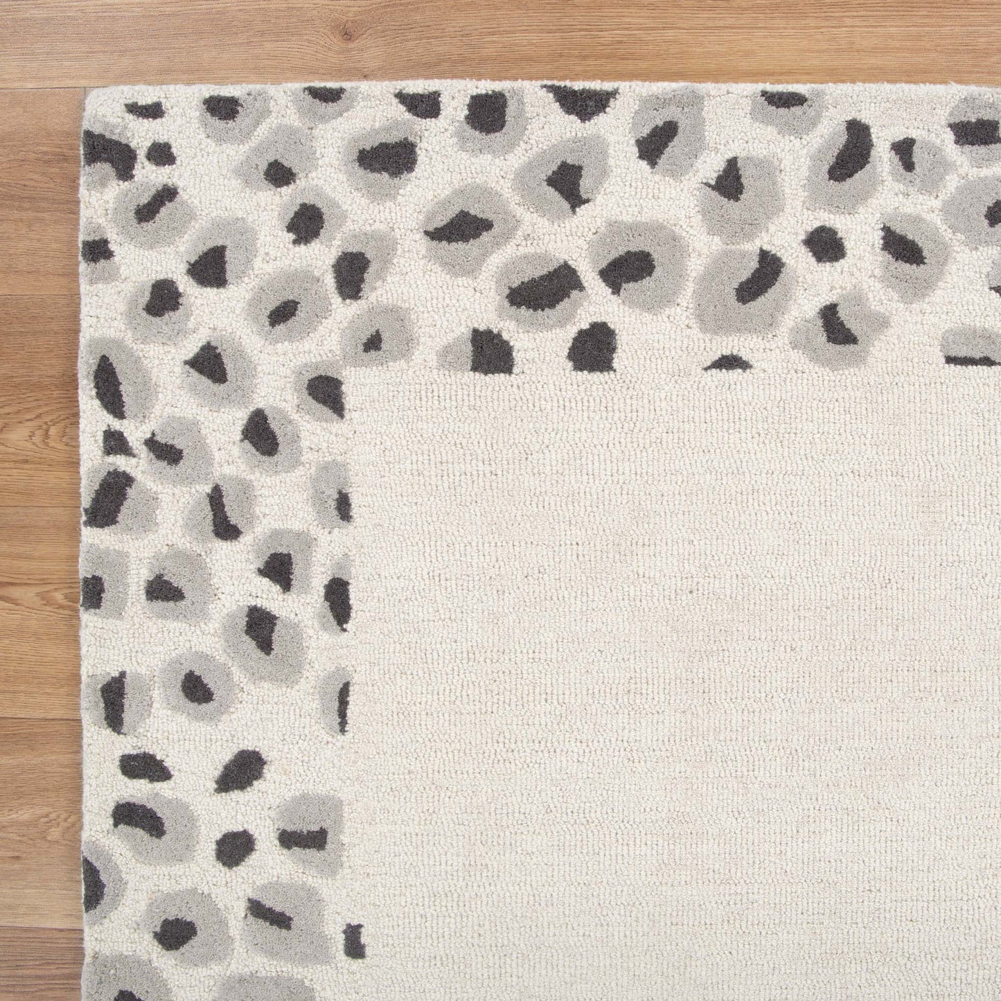 Frayla Leopard Cream Grey Wool Rug