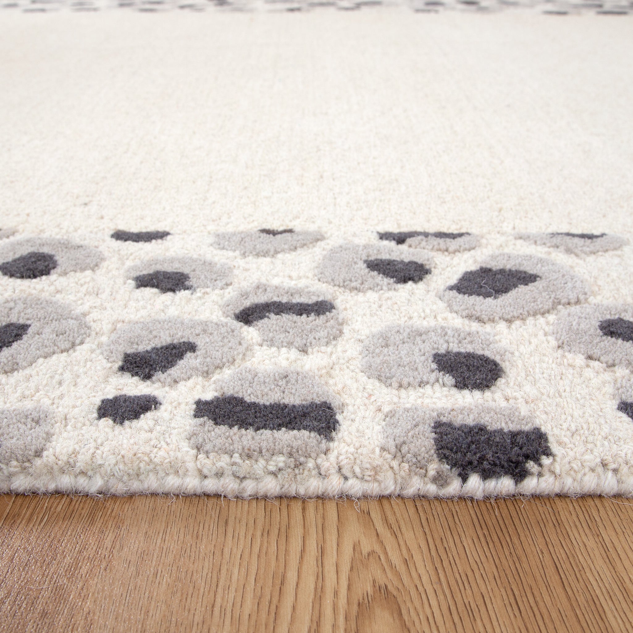 Frayla Leopard Cream Grey Wool Rug