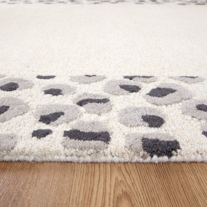Frayla Leopard Cream Grey Wool Rug